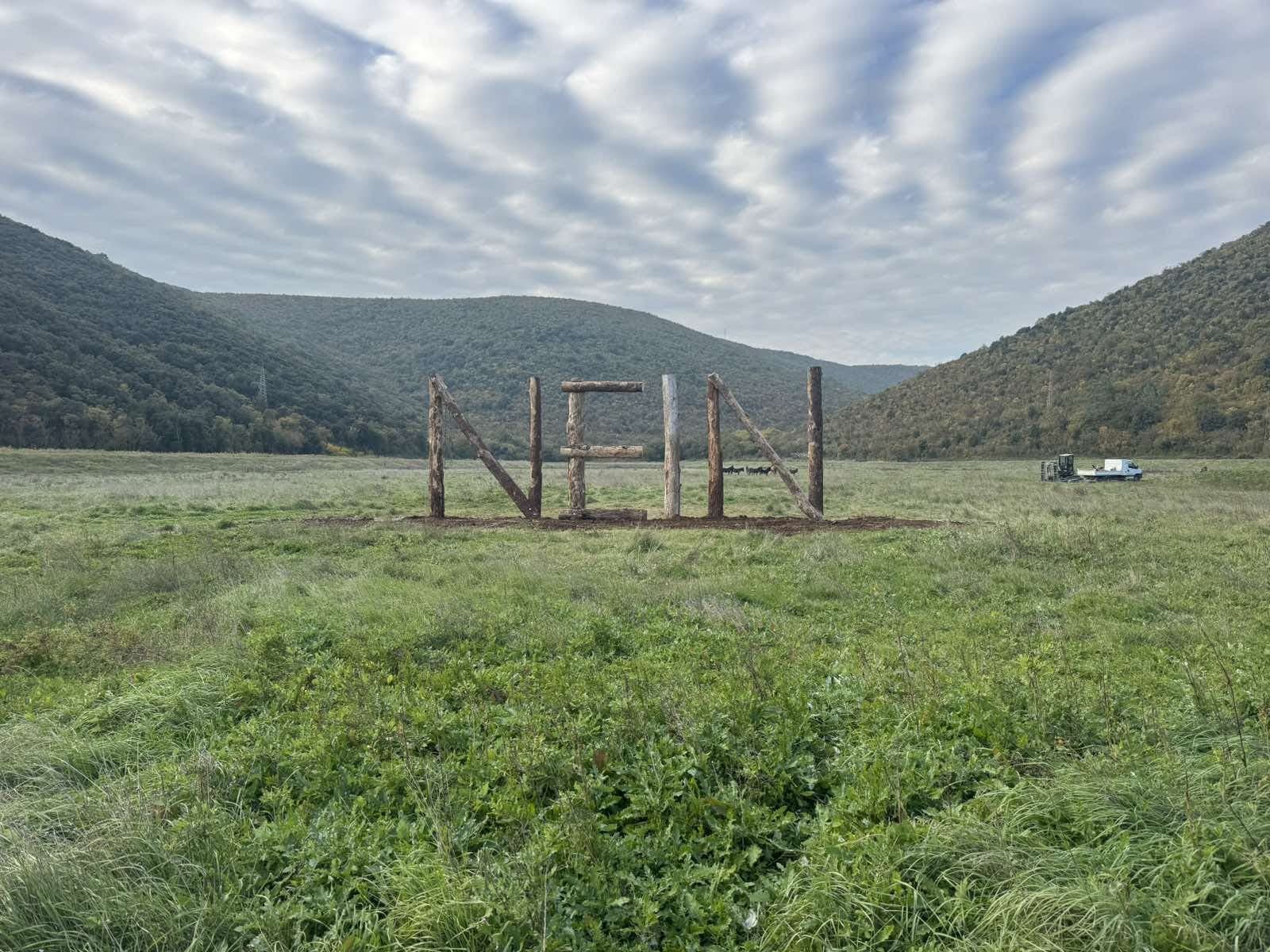 Nein sculpture made of logs in Istria, Croatia